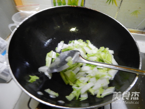 <a href=/shicai/shucai/BaiCai/index.html target=_blank><u>白菜</u></a><a href=/shicai/mimian/FuZhu/index.html target=_blank><u>腐竹</u></a>煮<a href=/shicai/mimian/NianGao/index.html target=_blank><u>年糕</u></a>的做法