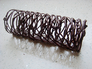 <a href=/shicai/mimian/QiaoKeLi/index.html target=_blank><u>巧克力</u></a>蛋糕